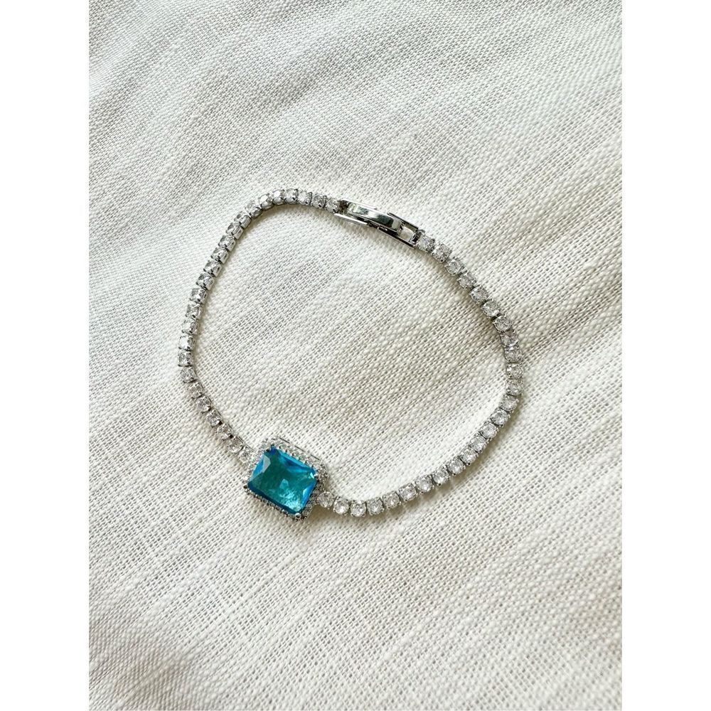 Light blue elongated radiant cut tennis bracelet - 7 3/4 inches long